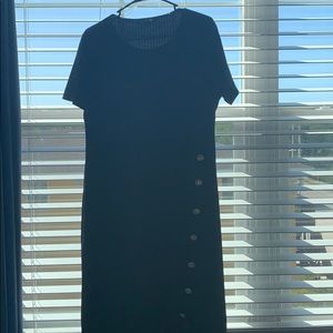 A black with gold button design to the side